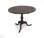 An antique English oak tilt-top circular Georgian breakfast table, late 18th century, 70cm high, 91cm diameter