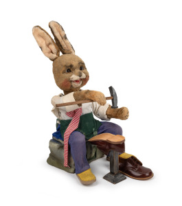 AUTOMATON: Rabbit cobbler with clockwork mechanism, manufactured in Germany, mid 20th century. Note: Prominently displayed in the window of the Halls of Toorak shoe shop, Melbourne. 49cm high.