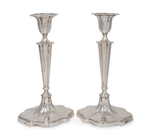 A pair of vintage sterling silver fluted candlesticks (weighted bases), made in Birmingham, early to mid 20th century, 29.5cm high, 1700 grams total (including weighted bases).