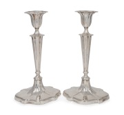 A pair of vintage sterling silver fluted candlesticks (weighted bases), made in Birmingham, early to mid 20th century, 29.5cm high, 1700 grams total (including weighted bases).