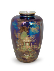 W. & R. CARLTON WARE Pagoda vase with purple blue lustre finish and gilt highlights, early 20th century, black swallow mark to base, 23cm high.