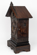BLACK FOREST antique German cuckoo and quail clock, three train movement with skelentonised plates and coil gong strike, 19th century, 67cm high. - 2