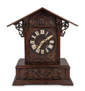 BLACK FOREST antique German cuckoo clock with skeletonized movement stamped "GHS For Gordian Hettich Sohn" and fusee time train and going barrel cuckoo strike, 19th century, 48cm high.