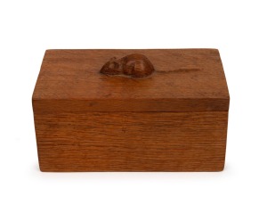 MOUSEMAN English Arts & Crafts box made from a single block of oak, by ROBERT THOMPSON with his signature carved mouse to the top (note: with early long tail), circa 1930s, ​​​​​​​10cm high, 17.5cm wide, 10cm deep.