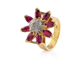 A vintage 18ct yellow gold, ruby and diamond ring, stamped "750", 10.2 grams.