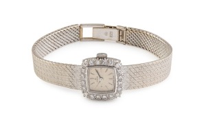 OMEGA cocktail watch in 18ct white gold case and bracelet with diamond bezel, ​​​​​​​34 grams not including movement.