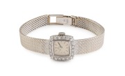 OMEGA cocktail watch in 18ct white gold case and bracelet with diamond bezel, ​​​​​​​34 grams not including movement.