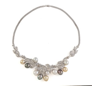 An impressive 14ct white gold and diamond cocktail necklace adorned with tri-coloured cultured South Sea pearls, 67 grams total.