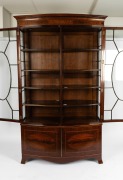 A handsome antique English Sheraton Revival bow fronted mahogany display cabinet with astragal glazed doors, late 19th century, 223cm high, 135cm wide, 40cm deep. - 2