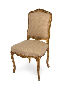 An antique French Louis XV style carved and gilded hall chair, 19th century. PROVENANCE: Grace Antique Galleries, Melbourne