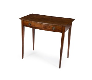 A Georgian mahogany bow fronted single drawer hall table, late 18th century, 72cm high, 76cm wide, 46cm deep. PROVENANCE: John Wilson Antiques, Melbourne