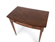 A Georgian mahogany bow fronted single drawer hall table, late 18th century, 72cm high, 76cm wide, 46cm deep. PROVENANCE: John Wilson Antiques, Melbourne - 2