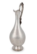 WILLIAM EDWARDS (attributed) of Melbourne Australian silver wine ewer, repousse decoration with applied grapes and leaves, engraved "PRESENTED BY F.C. WALKER TO P. GLENISTER AS A TOKEN OF RESPECT, July 23rd, 1873", 19th century, stamped "W.E." flanked by 