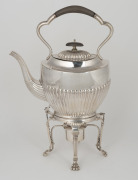 An antique English sterling silver spirit kettle with lion paw feet, made in Birmingham, early to mid 20th century, 34cm high, 989 grams total including timber handle.
