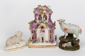 ROCKINGHAM antique English pearl ware cottage ornament; together with two antique English Staffordshire sheep ornaments, (3 items), A/F, the largest 15cm high.