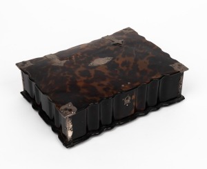 An Indo-Portuguese antique tortoise shell casket with silver fittings, 18th/19th century, 6cm high, 19cm wide, 14.5cm deep.
