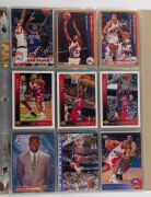 A quantity of NBA collector cards all in slip-in pages and in excellent condition; mainly 1992-95 period. (approx. 200). - 9
