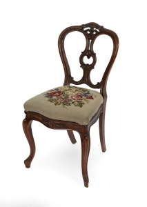 An antique English carved walnut dining chair with cabriole legs and later tapestry drop-in seat, circa 1870.