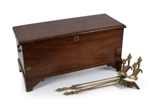 An antique camphorwood blanket box, 19th century, together with some brass fire irons and rests, 50cm high, 100cm wide, 42cm deep.