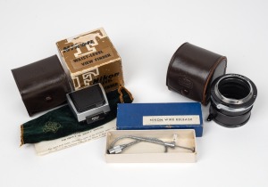 NIPPON KOGAKU: Group of three camera attachments - one Model 2 Nikon F Waist-Level finder with Nippon Kogaku leather pouch and maker's box, one Nikon Wire Release in maker's box, and one K1-5 set of lens adapters in Nippon Kogaku leather pouch. (3 items)