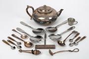 ROBUR silver plated teapot, GEORG JENSEN stainless steel salad servers, assorted cutlery, pewter cup and wine stopper, 20th century, (18 items)