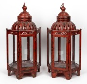 A pair of Indian metal and glass painted hanging lanterns, ​​​​​​​70cm high overall.