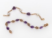 Two gold and amethyst bracelets, one with cultured pearls, one stamped "750", 17cm and 19cm long, 16 grams total including stones and pearls.