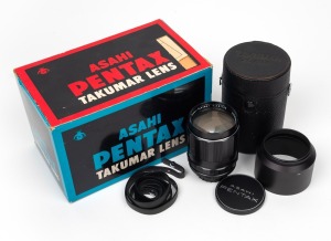 ASAHI KOGAKU: Super-Takumar 135mm f2.5 lens with maker's box, Pentax lens cap, Asahi lens hood, Takumar lens case, and strap.