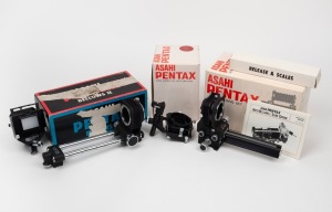 ASAHI KOGAKU: Group of three accessories, each in maker's box - one Pentax Bellows II, one Pentax Auto Bellows Set with double cable release and two scales, and one Pentax Slide Copier For Auto Bellows. (3 items)