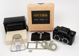GOMZ: Sputnik stereo&nbsp;TLR camera with twin T-22 75mm f4.5 lenses [#012701], three lens caps, 'OMO'&nbsp;leather case, maker's box, and viewer elements, c. 1955.