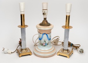 A pair of brass and silver finished table lamp bases; together with an antique milk glass table lamp base, (3 items), ​​​​​​​the pair 34cm high overall.