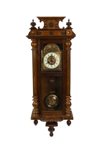 An antique Austrian wall clock in walnut case with time and strike spring driven movement, 19th/20th century, 125cm high