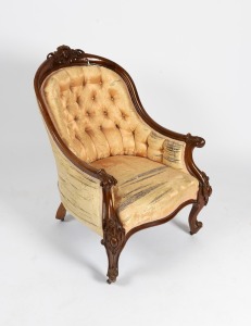 A good quality antique English walnut armchair with finely carved decoration, circa 1860, note: silk upholstery worn through in places, 92cm high, 67cm across the arms.