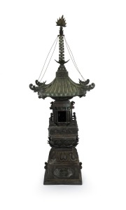 A Chinese bronze garden pagoda, manufactured in sections, 20th century, 125cm high.