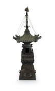 A Chinese bronze garden pagoda, manufactured in sections, 20th century, 125cm high.