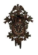 BLACK FOREST antique German cuckoo wall clock with three train weight driven movement playing a Swiss music box cylinder movement on the hour, with remnants of polychrome finish, 19th century. Note: Mismatched pendulum but weights present. 84cm high.