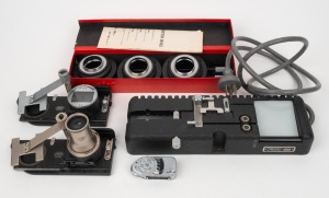 LEITZ: Group of five accessories - one complete BOOWU set in maker's box with instruction booklet, one Bindomat slide mount system with Australian power plug, one Leica-Meter MC, and two OOZAB slide copiers. (5 items)