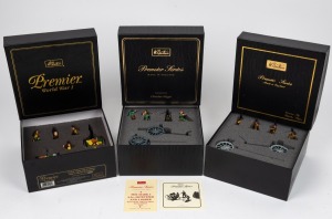 W. BRITAIN three near mint boxed "Premier Series" and "Premier Series WWI" artillery sets: I.) GERMAN 7.7 GUN & LIMBER WITH SERVICE DETACHMENT, II.) 4.5 HOWITZER WITH LIMBER AND FOUR MAN KHAKI DETACHMENT, III.) FRENCH 75mm GUN AND CAISSON WITH U.S. MARINE