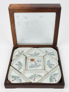 An antique Chinese porcelain savoury set, housed in a rosewood box with etched glass top, early 20th century, ​​​​​​​the box 30cm wide.