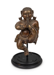 BALA KRISHNA antique bronze sculpture, South Indian origin, 19th century, 31.5cm high, 39.5cm overall including stand.