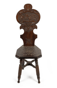 An antique chip carved kauri pine spinners chair, 19th/20th century, 105cm high