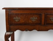 An English oak and mahogany three drawer dresser base with cabriole legs and brass swing handles, made in the Georgian style, early 20th century, 85cm high, 152cm wide, 48cm deep. - 2