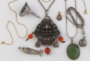 A Sino-Tibetan silver pendant on chain, a greenstone and silver pendant on silver chain, an Albertina style fob chain with bauble, a miniature silver funnel, a gold plated necklace, a 9ct gold and blue topaz pendant and an articulated fish pendant, mixed 