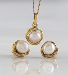 A 9ct yellow gold and pearl necklace together with matching earrings, stamped "375", ​​​​​​​the necklace 42cm long, 7 grams total.