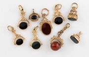 Nine assorted antique fobs, gold and gold plate, mostly 19th century.