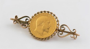 A 1906 Melbourne Mint half sovereign mounted in 9ct gold as a brooch. (Note: Missing pin and safety chain). 5.2cm wide, 6.3 grams total.