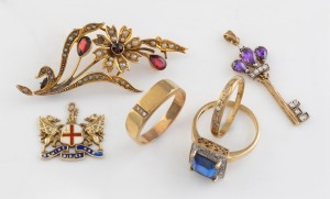 Three 9ct gold rings with stones, a 9ct gold and enamel coat of arms pendant, an antique 9ct gold, seed pearl and garnet floral brooch (missing pin), and a 9ct gold key pendant with stones, (6 items), ​​​​​​​17.1 grams total.