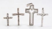 Four 18ct white gold crosses with white diamonds, ​​​​​​​14 grams total.