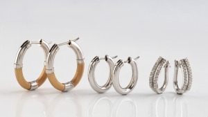 Three pairs of 18ct white gold earrings, ​​​​​​​12.4 grams total.