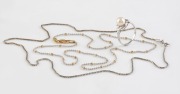 An 18ct white gold and pearl ring; together with two fine 18ct gold necklaces, (3 items), ​​​​​​​9 grams total.